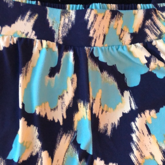 2 piece IMAN suit. Open jacket and pull on pants. Bright Navy, yellow, cheetah - Picture 12 of 16